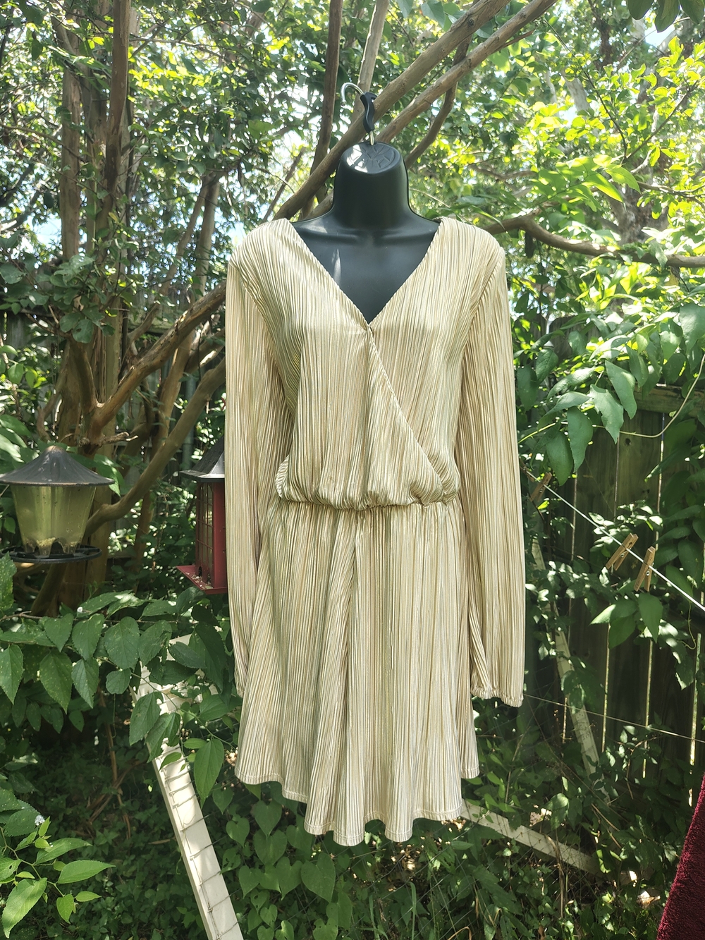 Rewind Pleated Wrap-Front Long Sleeve Romper in Light Gold